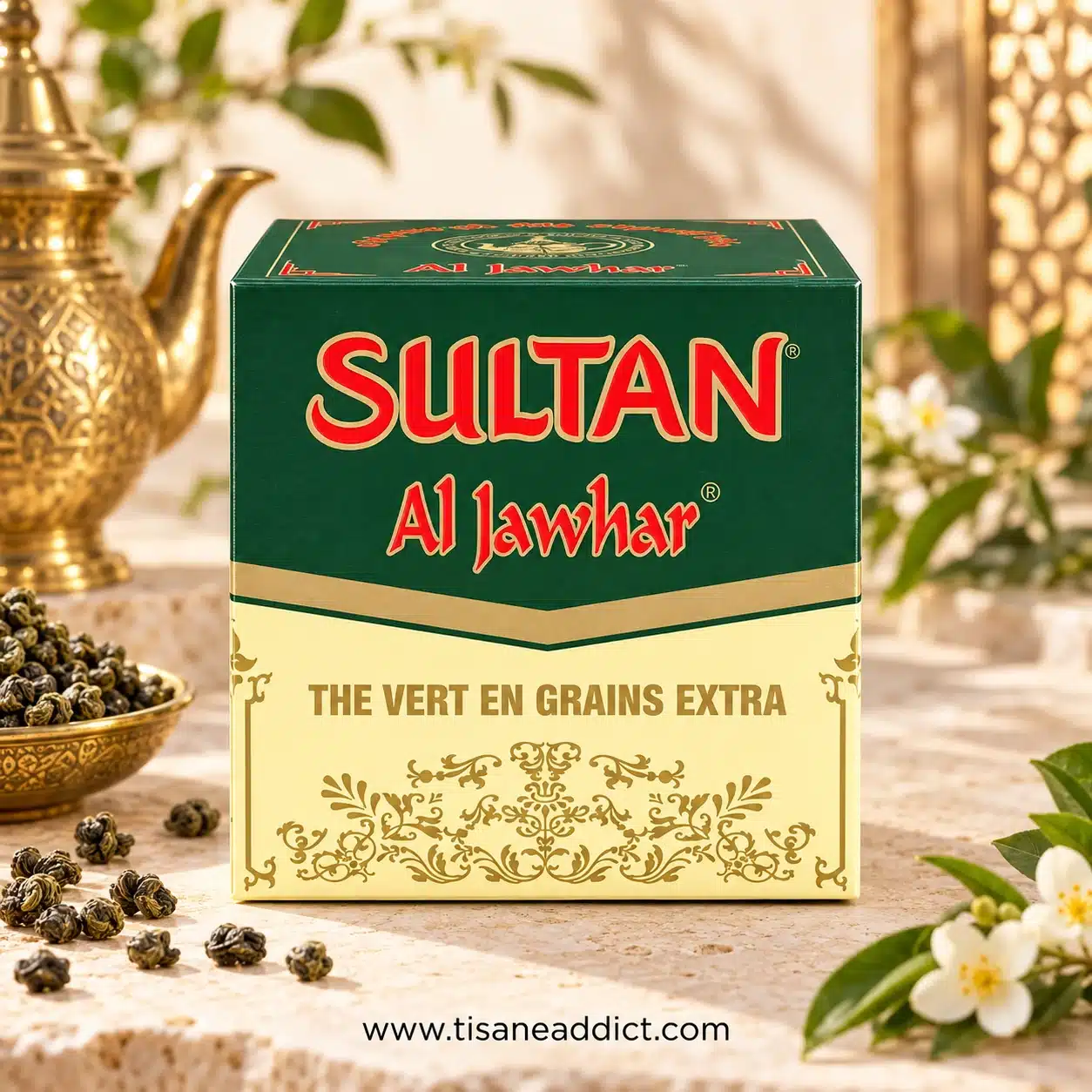 Boîte de thé vert Al Jawhar Sultan présentée de face avec des grains de thé vert